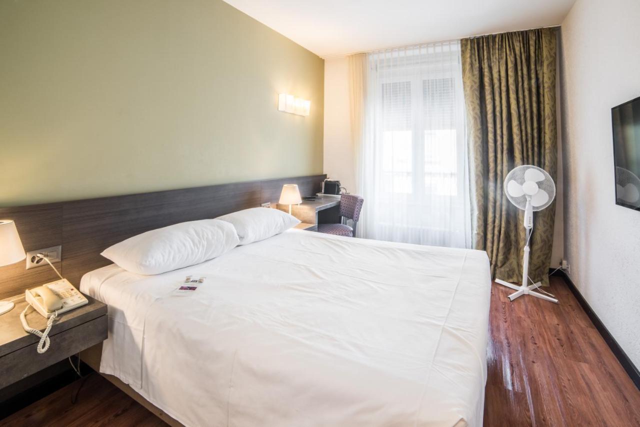 Hotel Montana Genebra Quarto foto