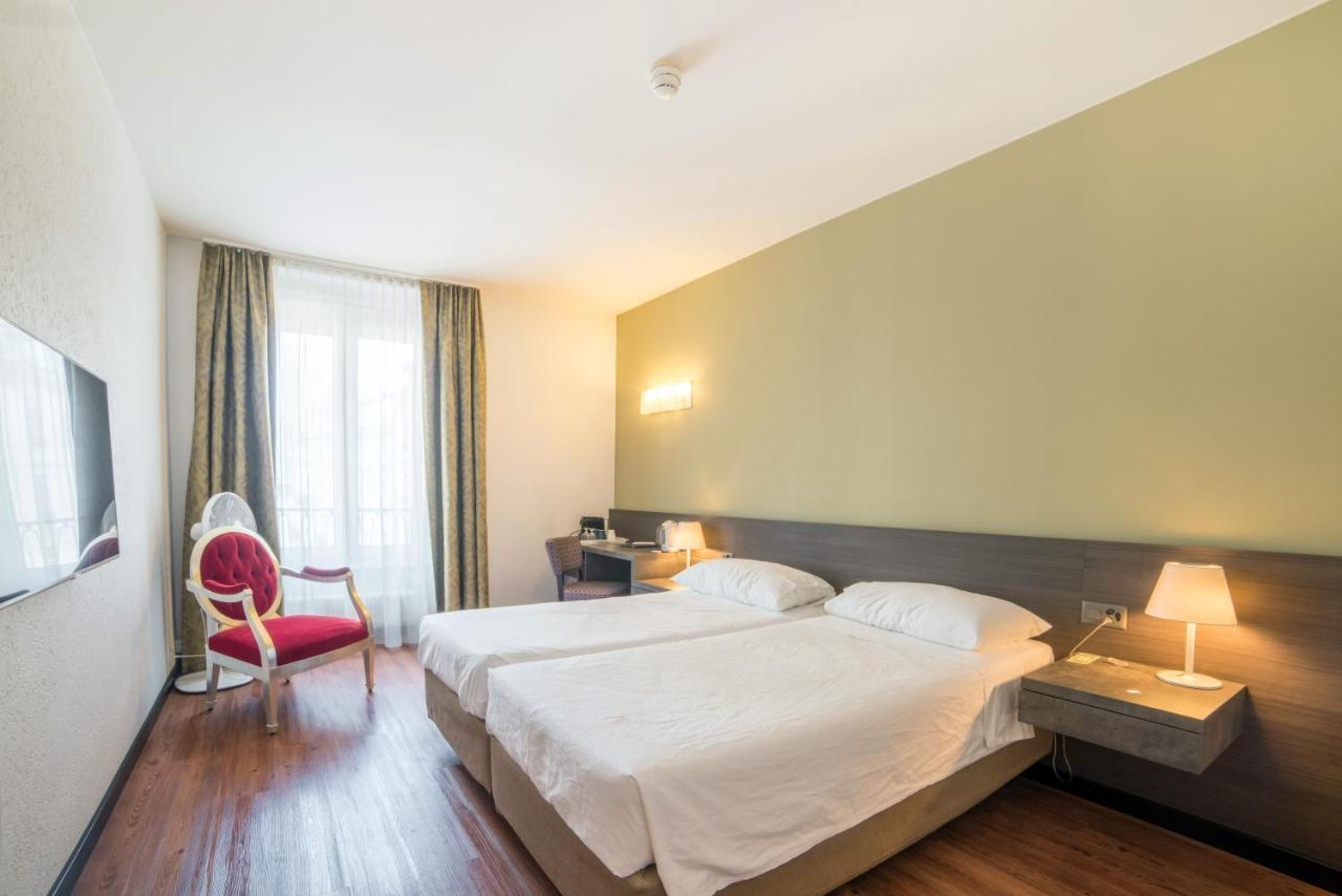 Hotel Montana Genebra Quarto foto